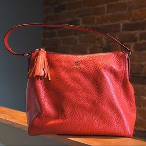 Late Spade orange pebble leather shoulder bag
